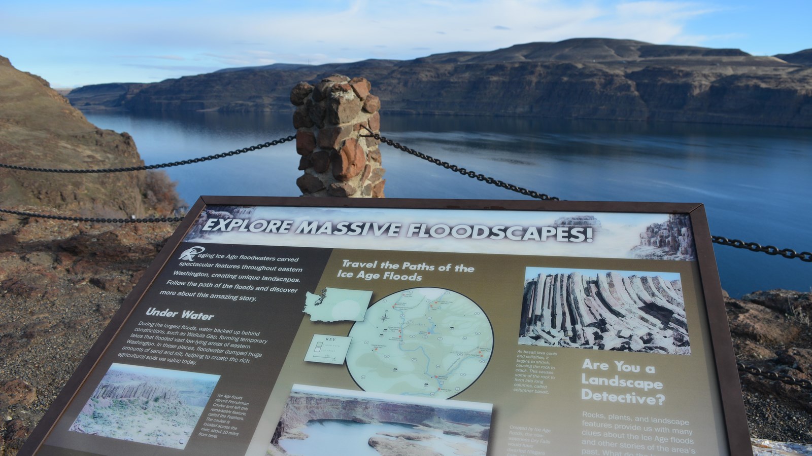 Wayside exhibit in the foreground with Columbia River in the background