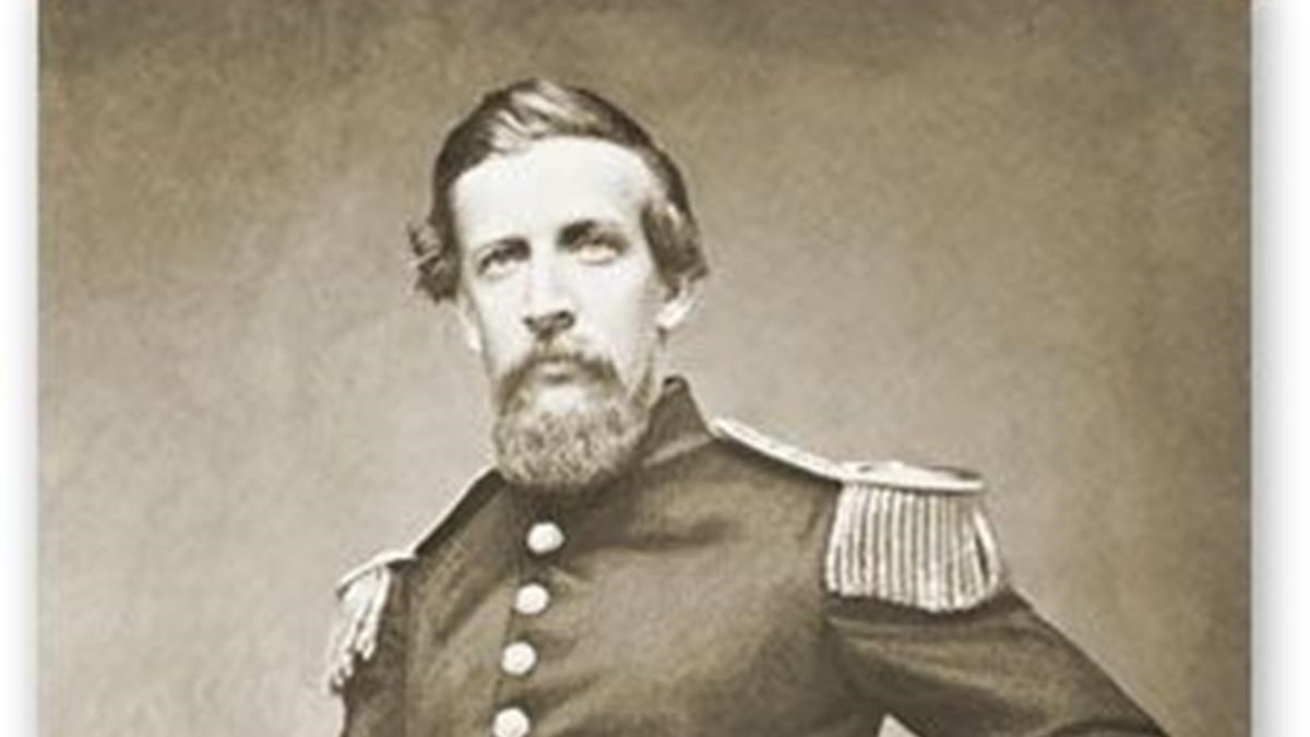 Black and white image of an officer in uniform 