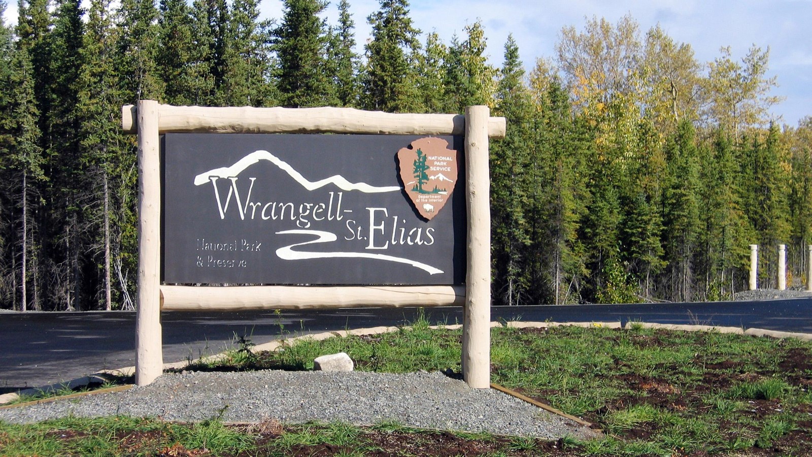 A large sign reads Wrangell St. Elias National Park and Preserve. 
