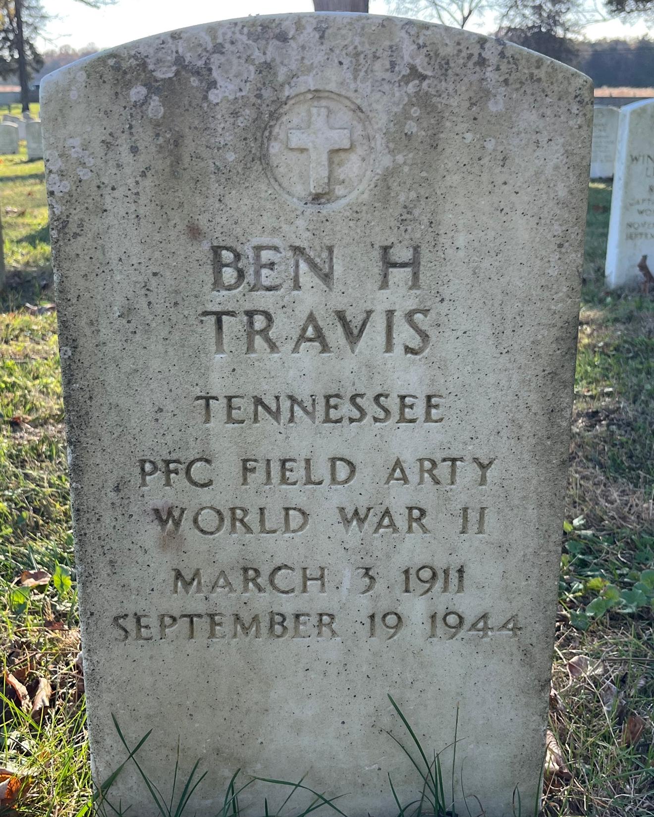 Headstone reading "Ben H Travis Tennessee PFC FIELD ARTY WWII March 3 1911 September 19 1944"