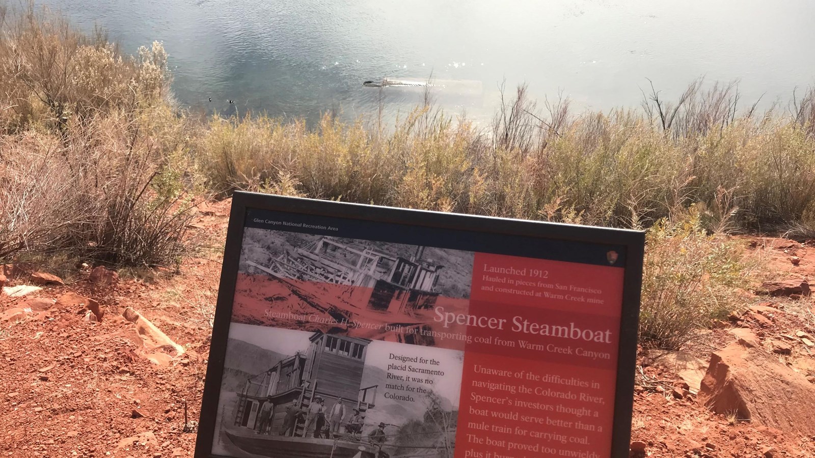 Interpretive sign overlooking Colorado River and sunken steamboat.