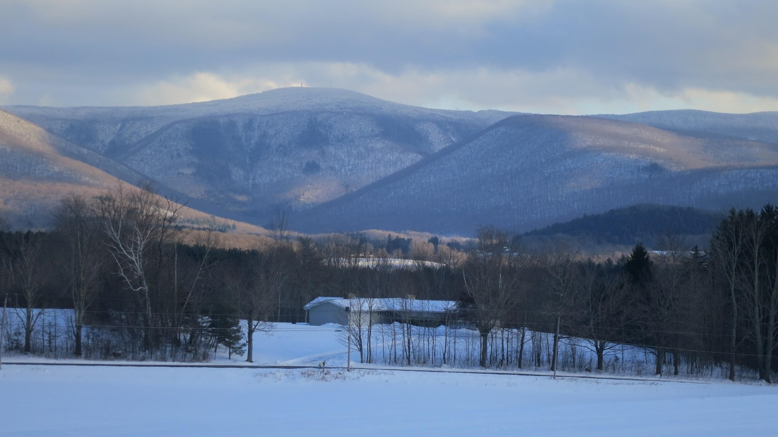 Photo of mountain in winter. 