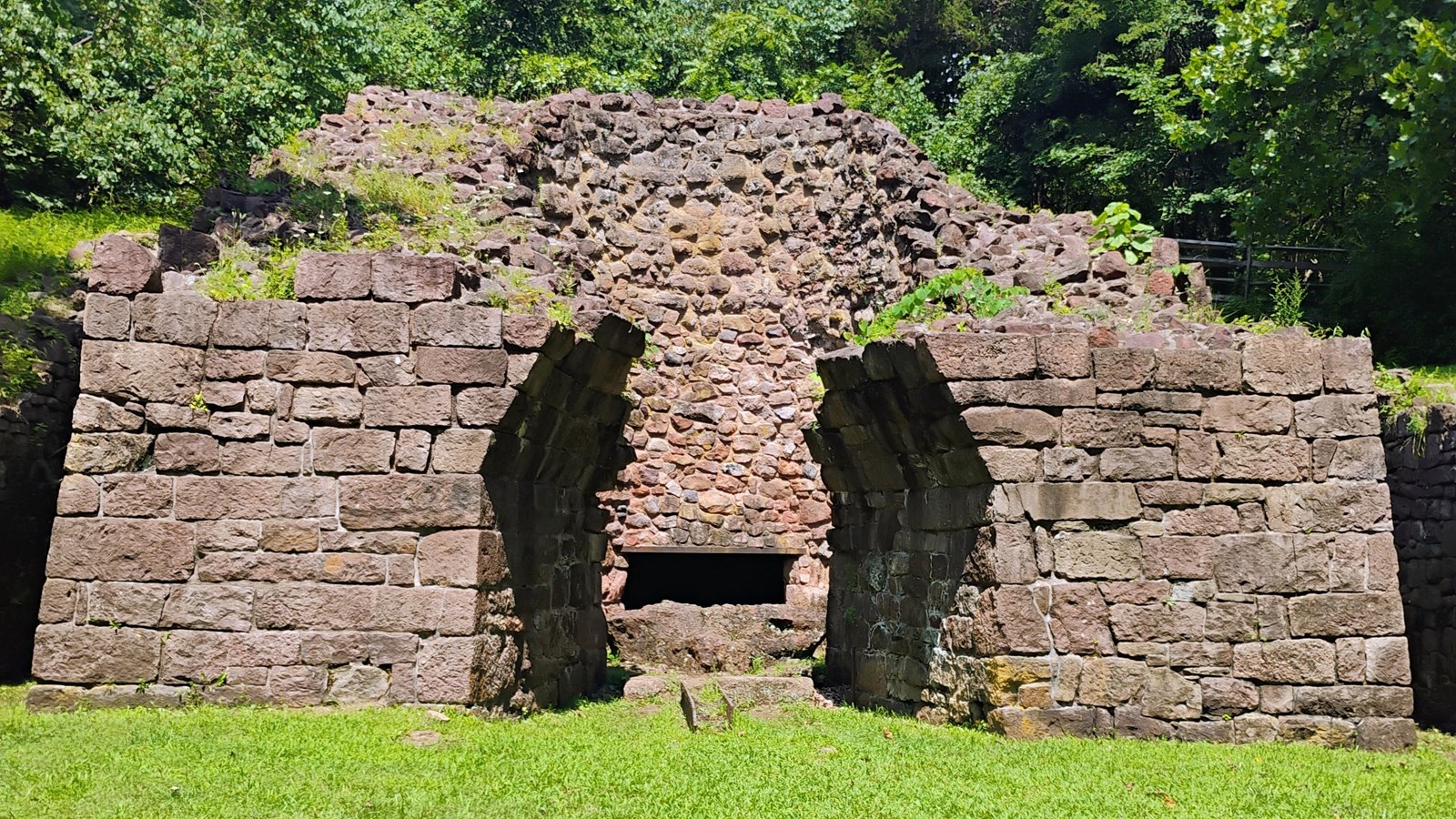 large stone ruins with open front and center