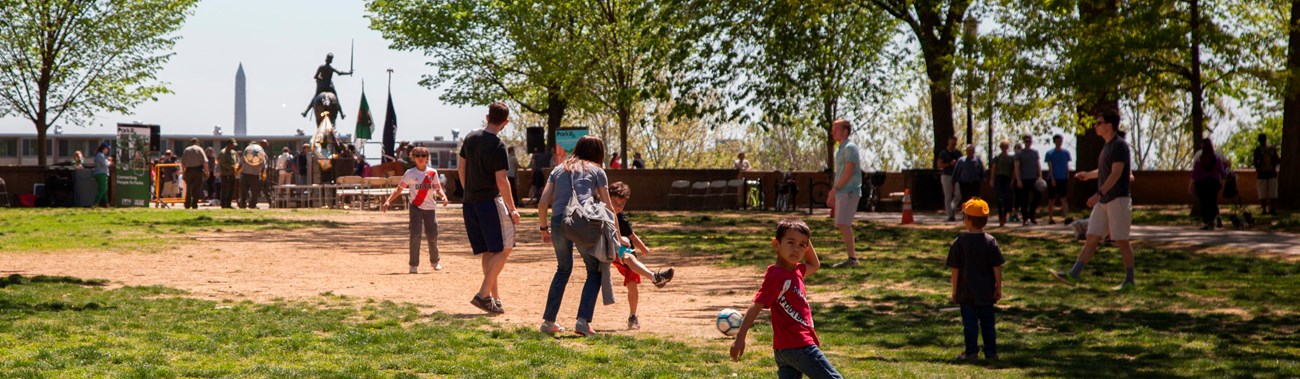 Visitors walk through Meridian Hill Park.