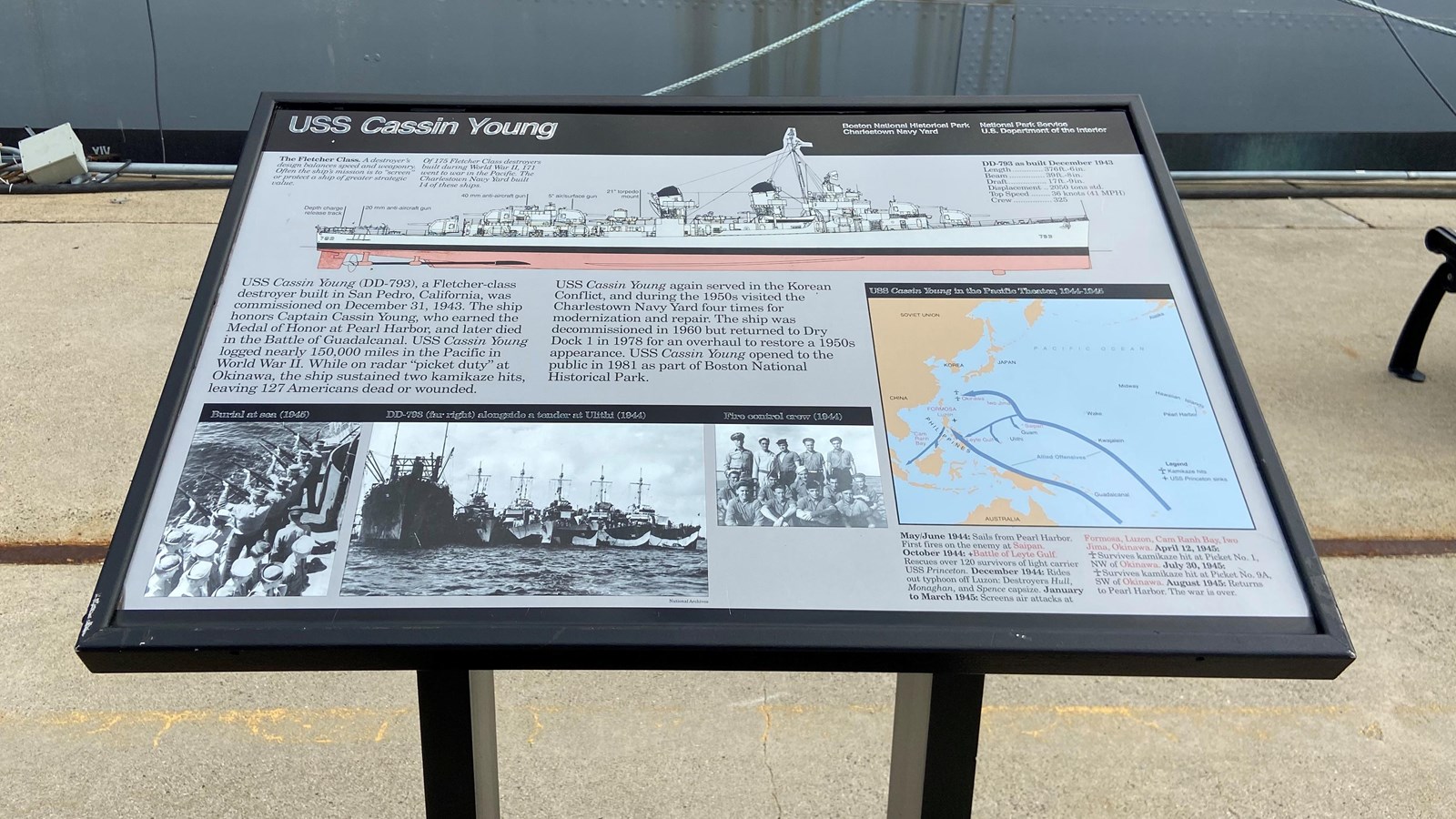 Wayside with images and text about the USS CASSIN YOUNG as well as a map of the Pacific.