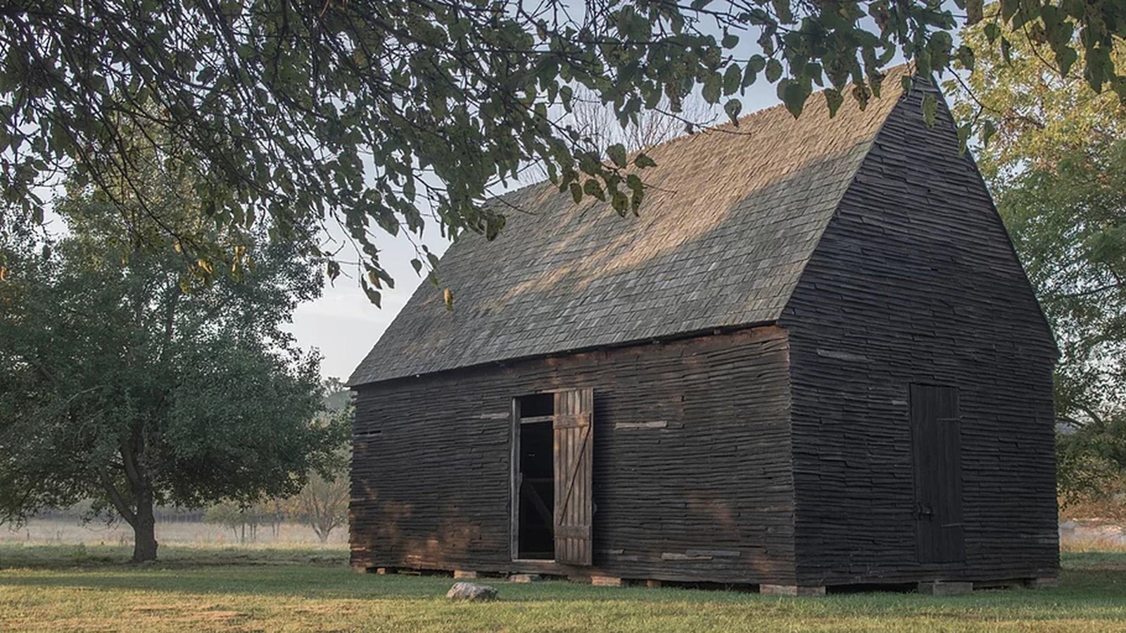A large barn of weathered wood