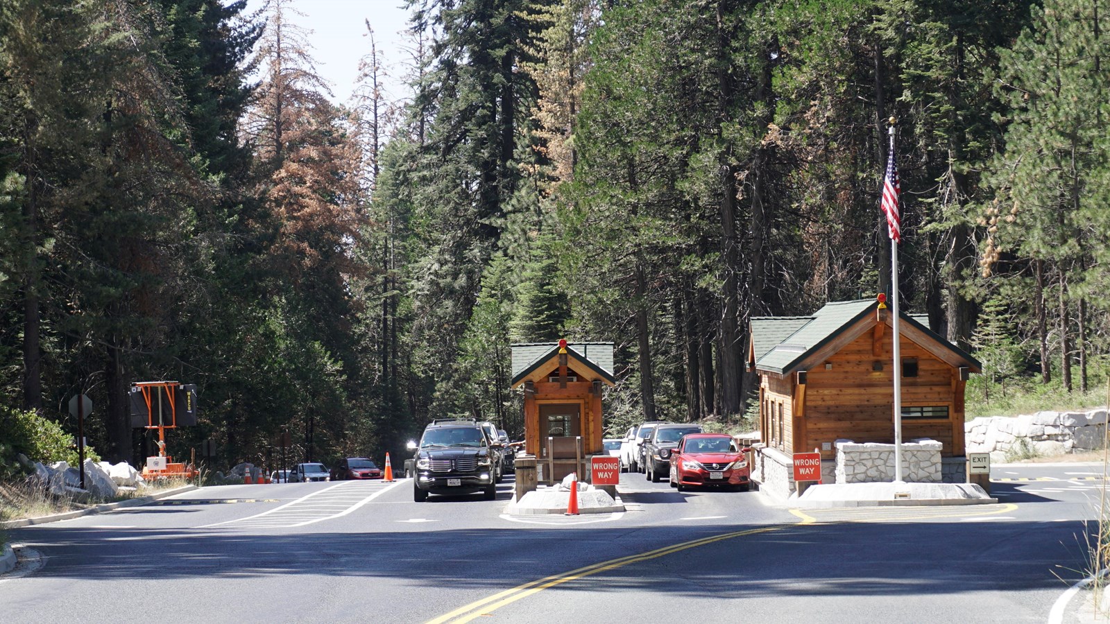 A road leads too small wooden buildings