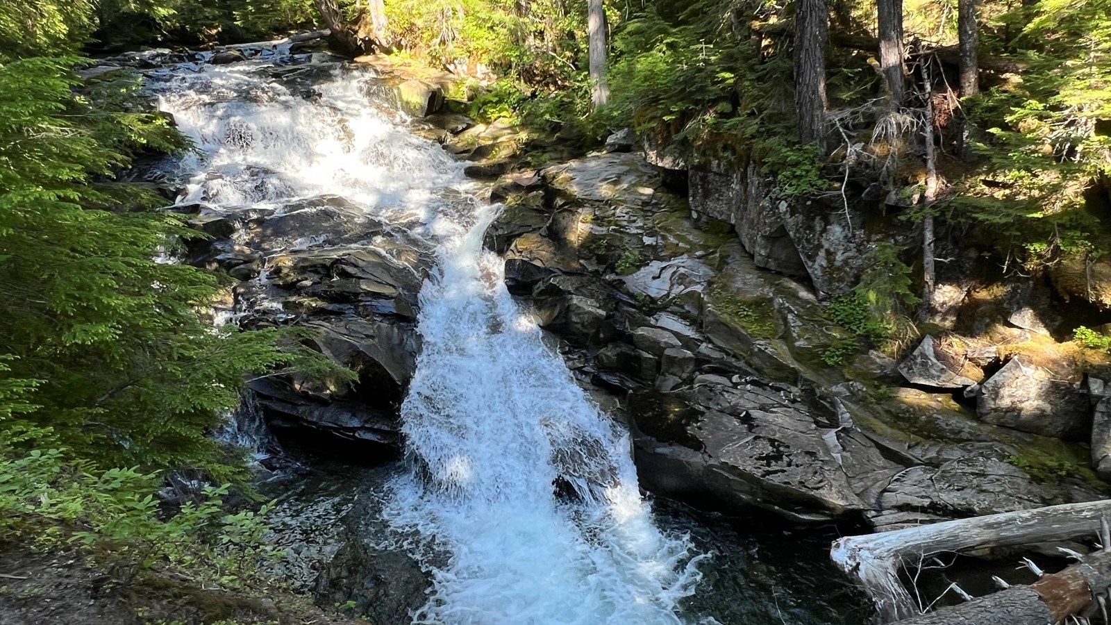 Short waterfall cascading down about 34 feet