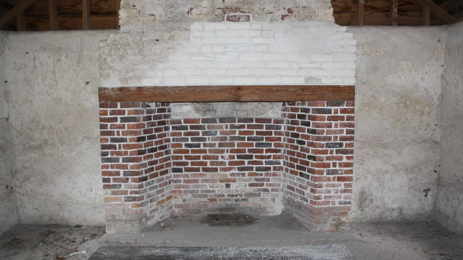 a red and white brick fireplace 