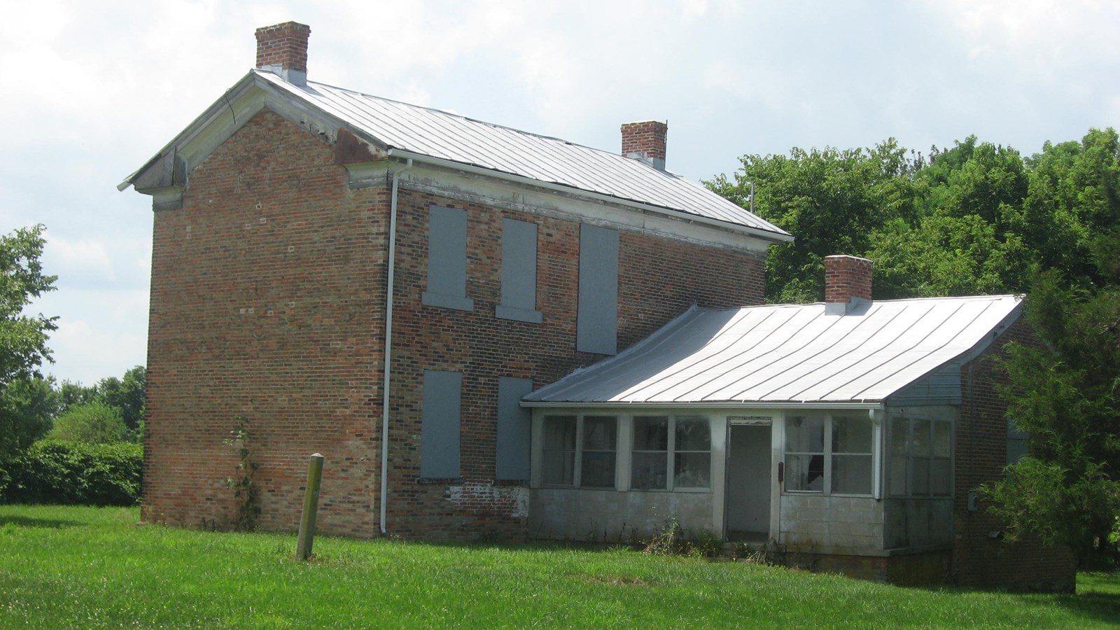 Two-story brick farmhouse. 