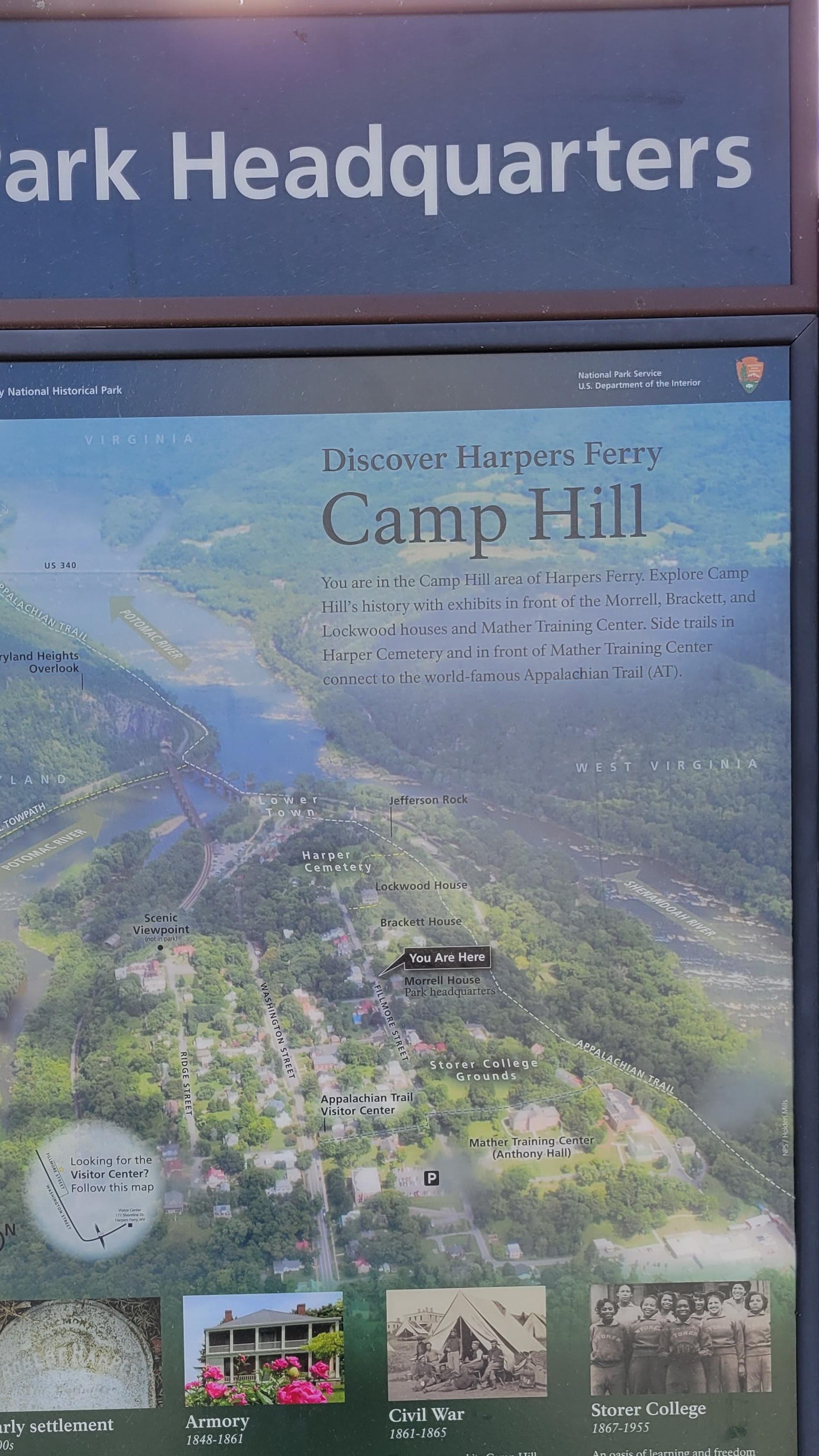 Vertically oriented wayside sign with map and information about the Camp Hill area