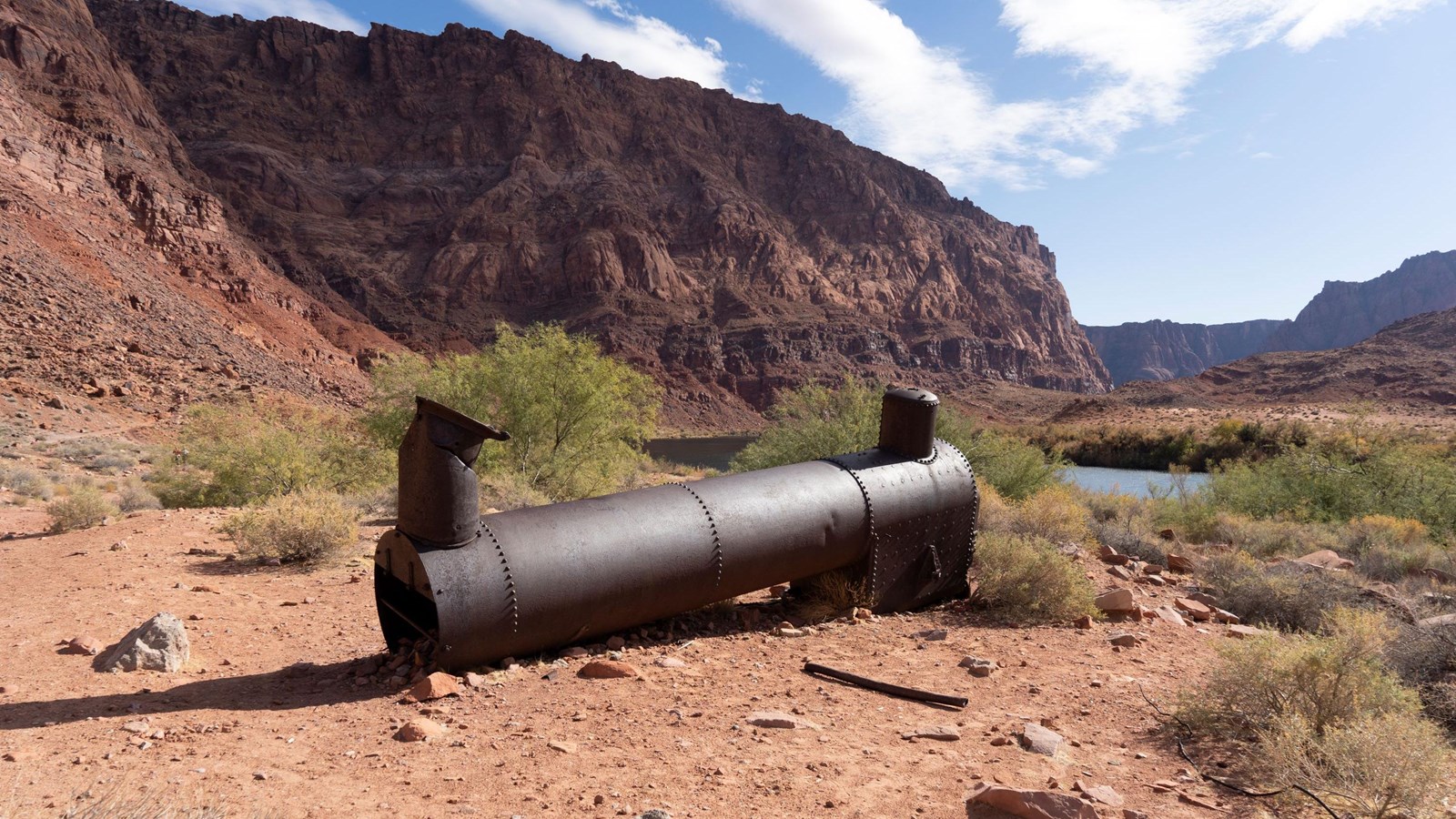 Old discarded large metal boiler. 