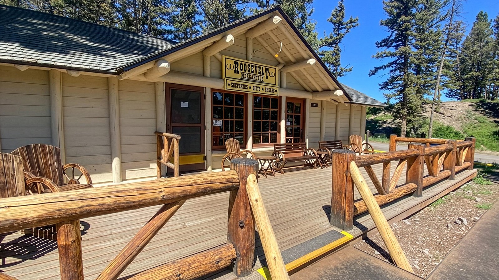 A rustic building with the sign: Roosevelt Mercantile