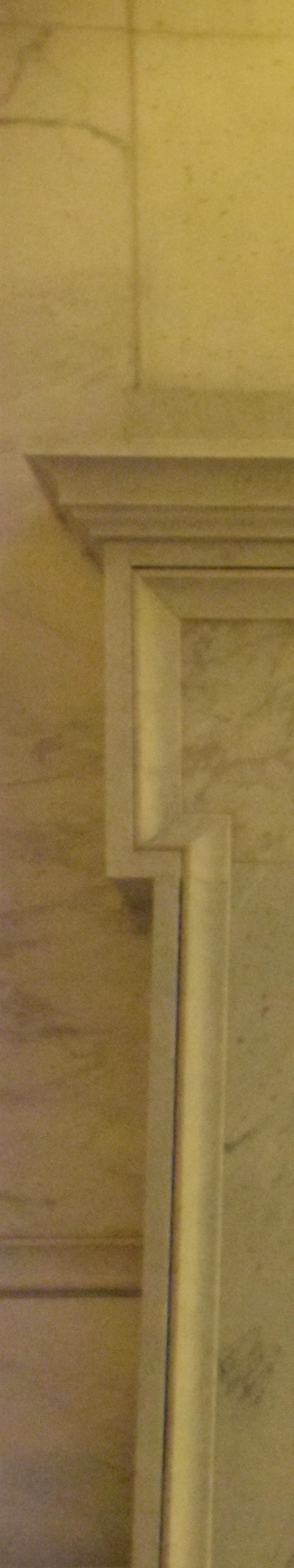 Flag Case visible through a stone doorway