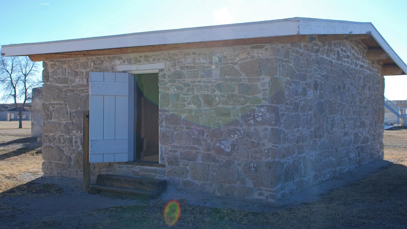 A stone building on a winter day.