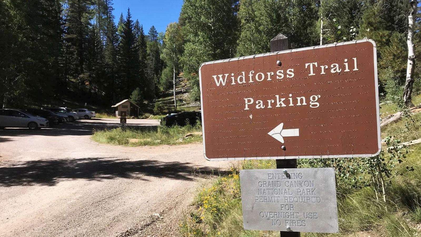 A brown sign reads
