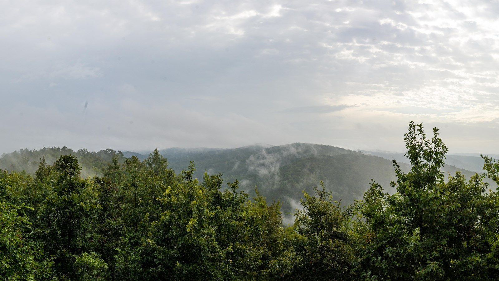 Got Rock overlook on a cloudy day. Mist is flowing from the mountains.