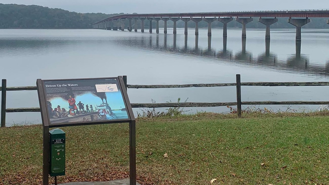 Informative panel explaining Trail of Tears in foreground. Tennessee River flows in distance