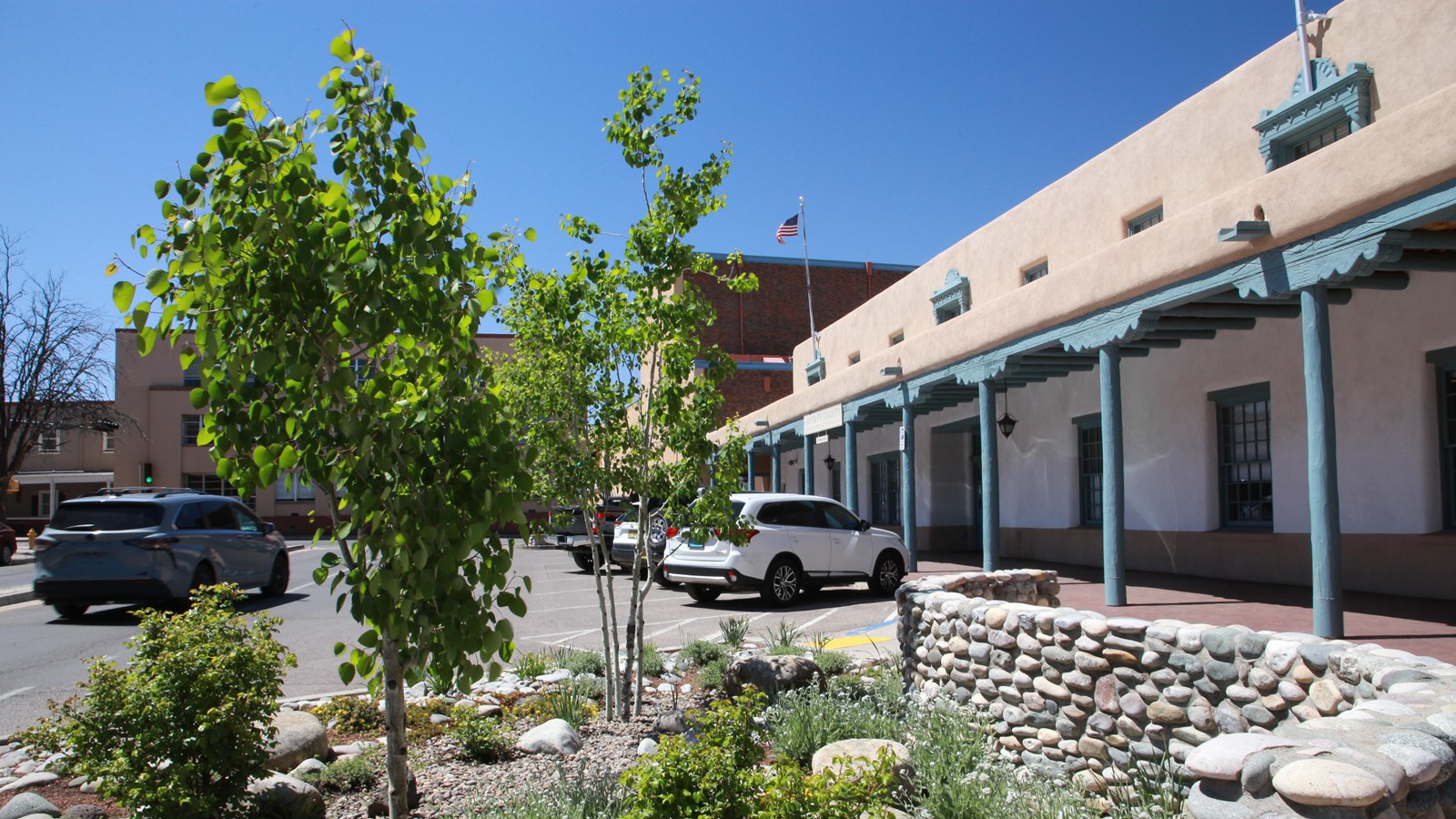 A two-story adobe building with a first floor hacienda.