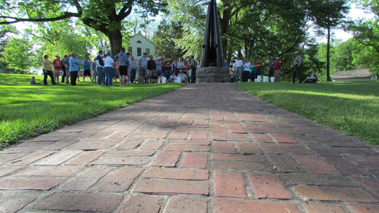A group of people tour the national cemetery