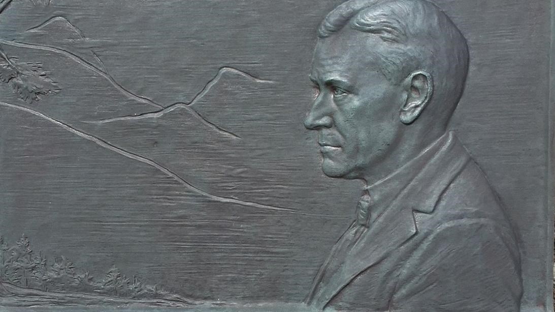 Bronze plaque embossed with depiction of Stephen T. Mather.
