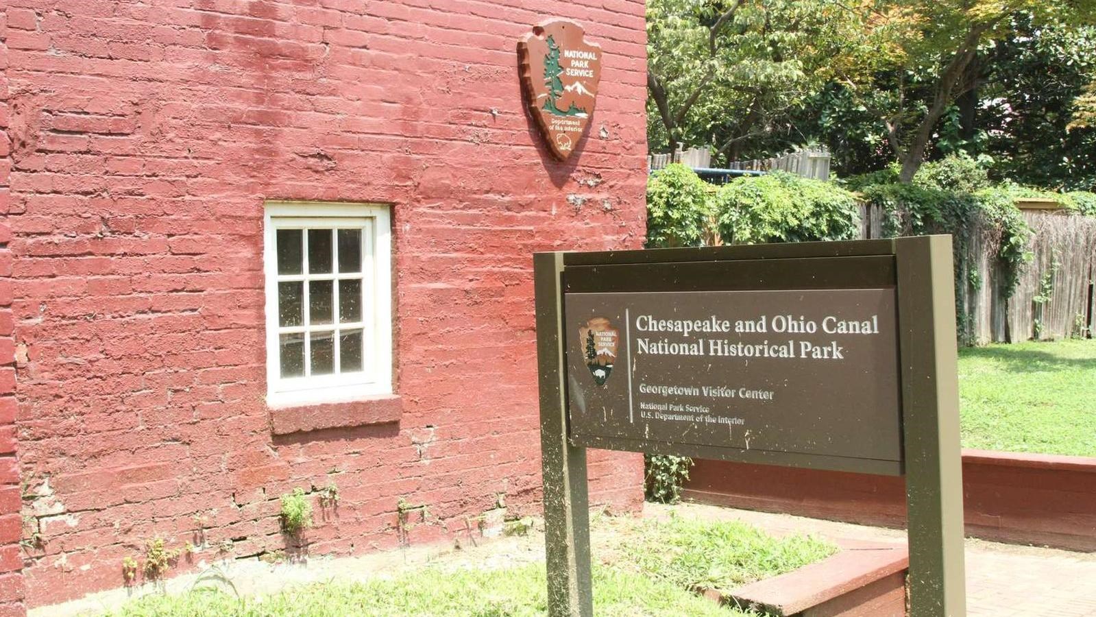 A red brick building with a National Park Service arrowhead on it. A sign indicates that it\'s the Ch