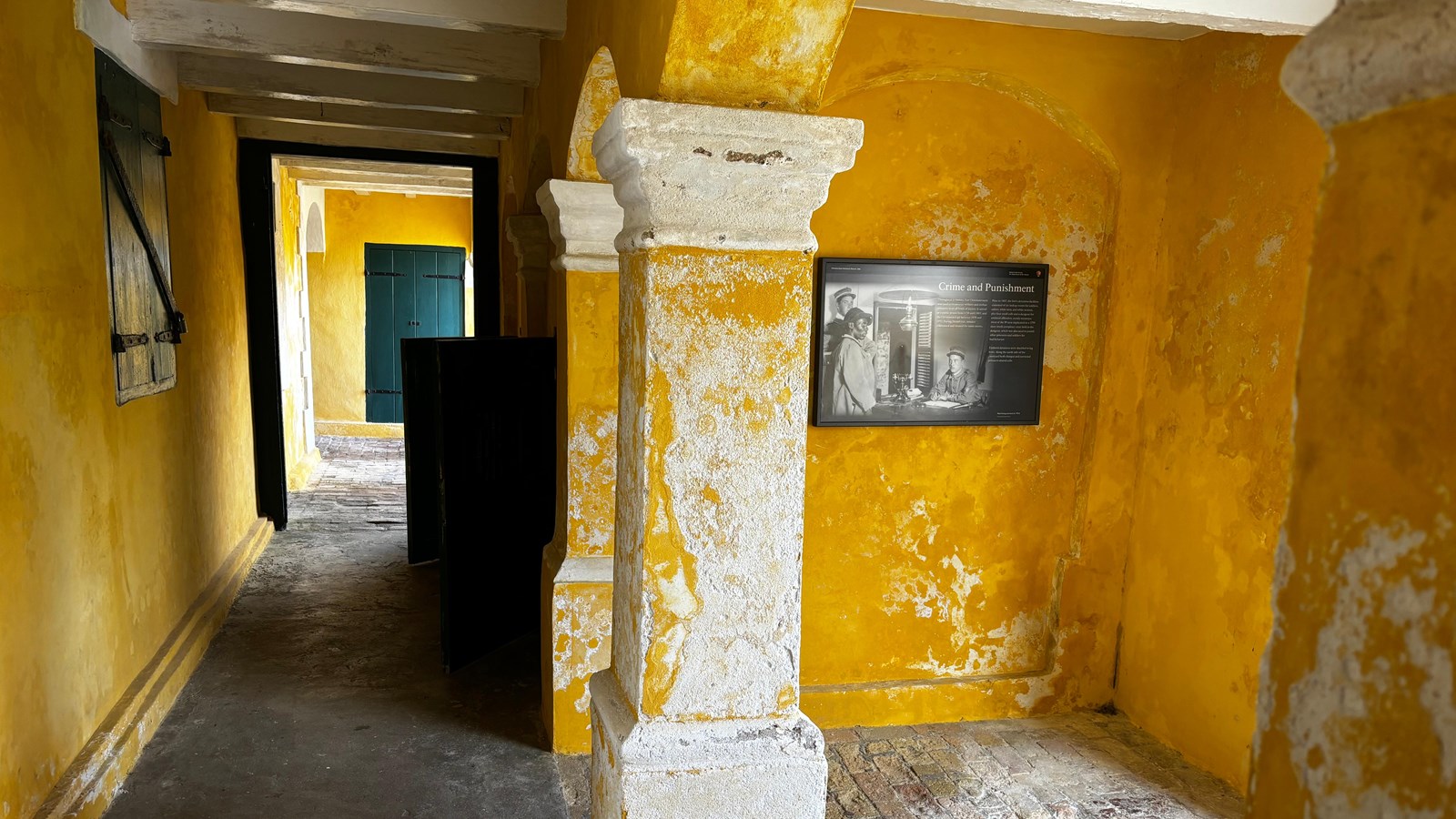 Photo of a hallway and small doors