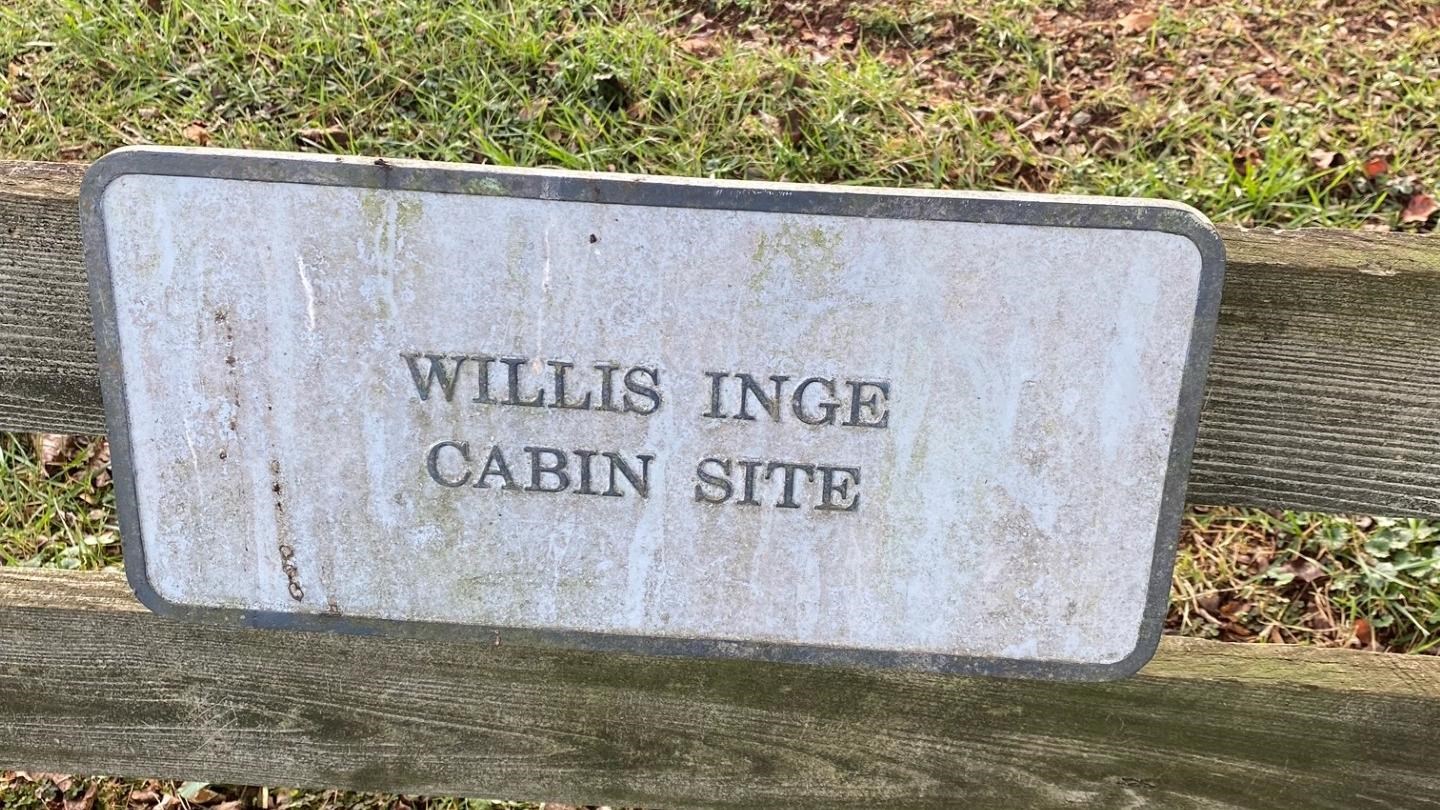 Metal sign reads