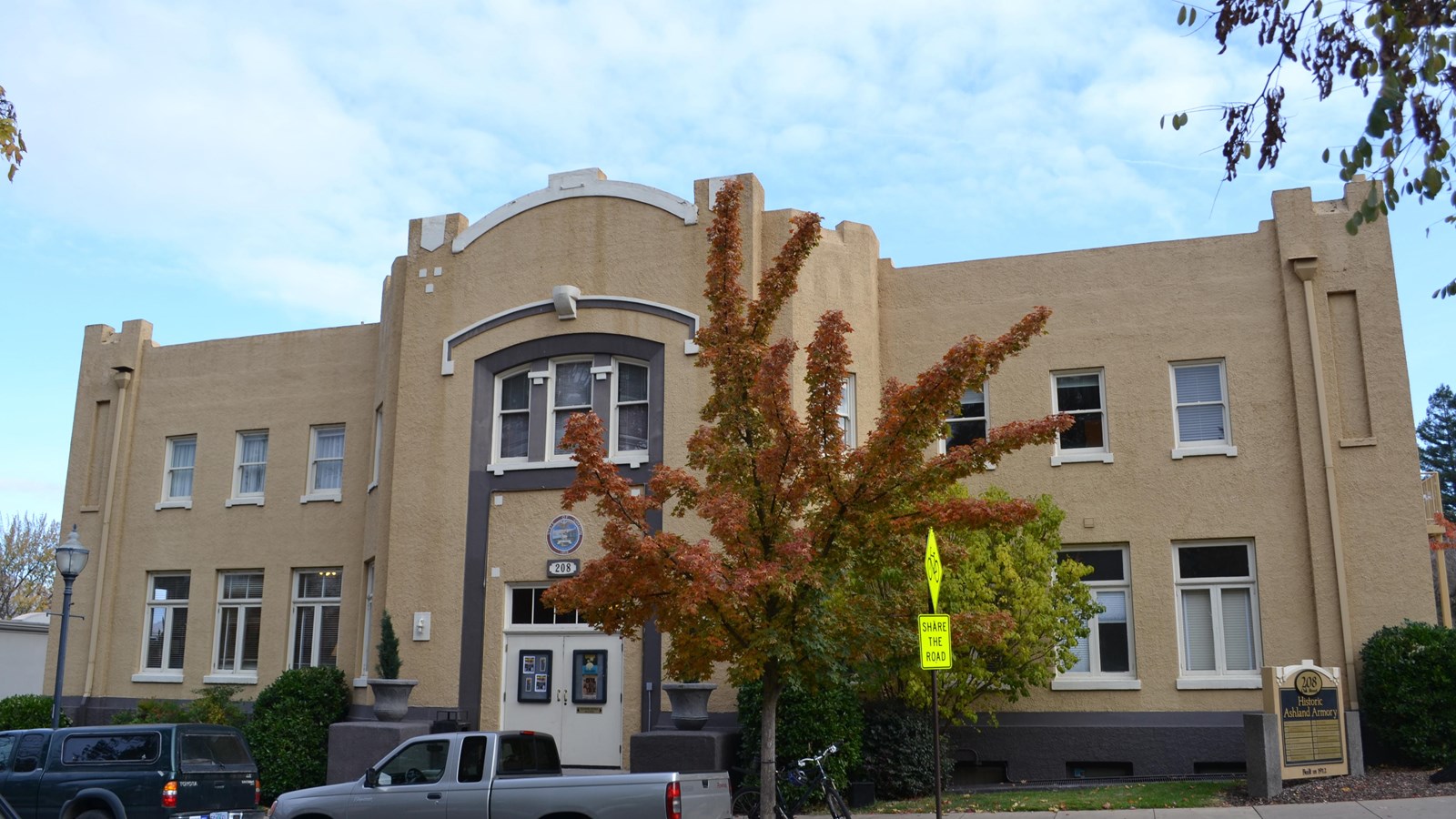 Photo of large concrete building. 