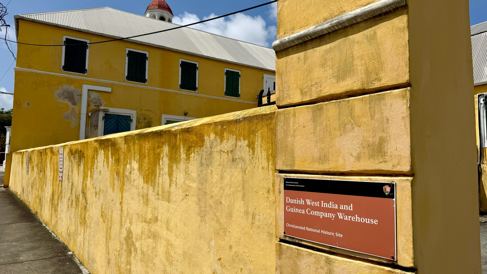 Yellow walls of a colonial warehouse building