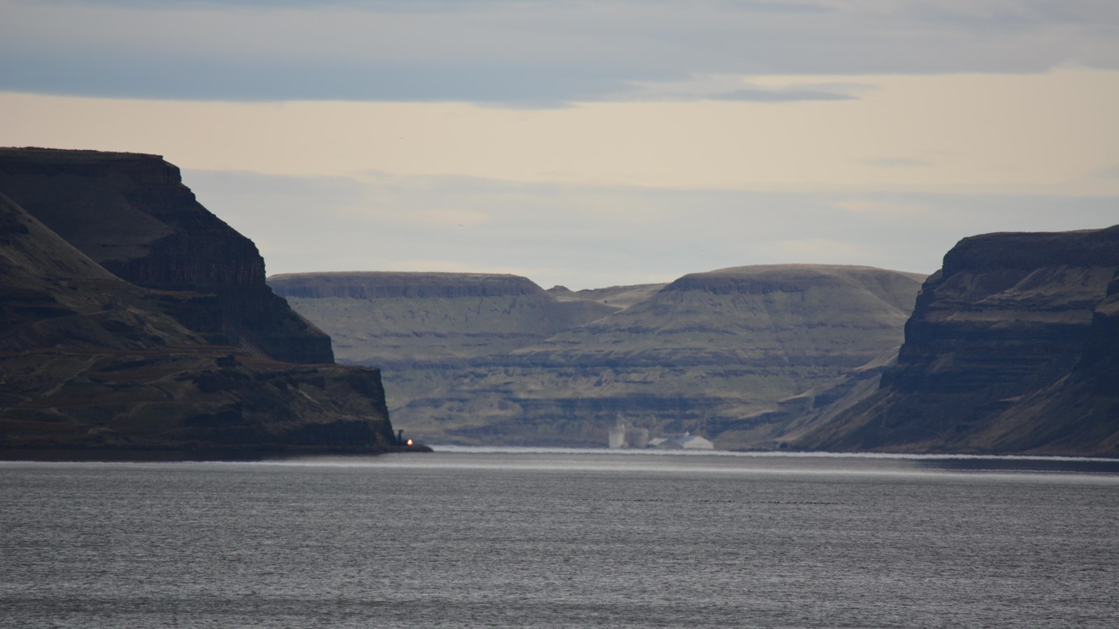 Looking at the Columbia River with buttes on either side