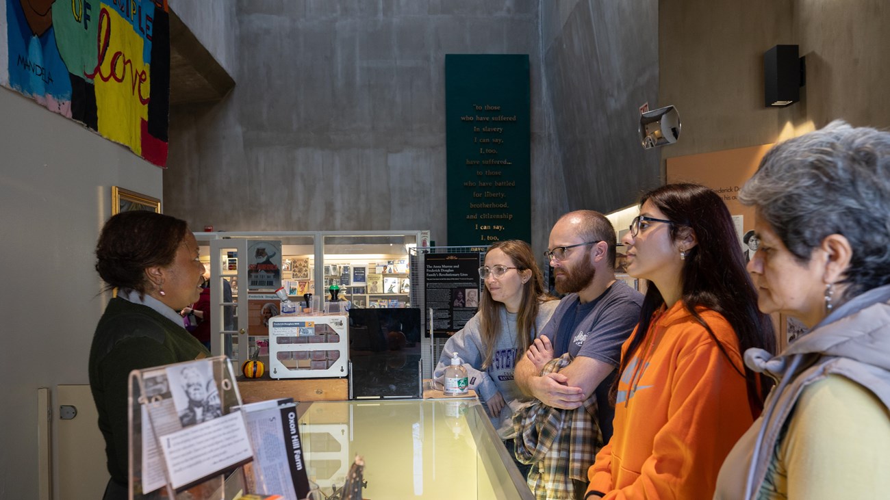 A Park Ranger gives information in the Frederick Douglass Visitor Center