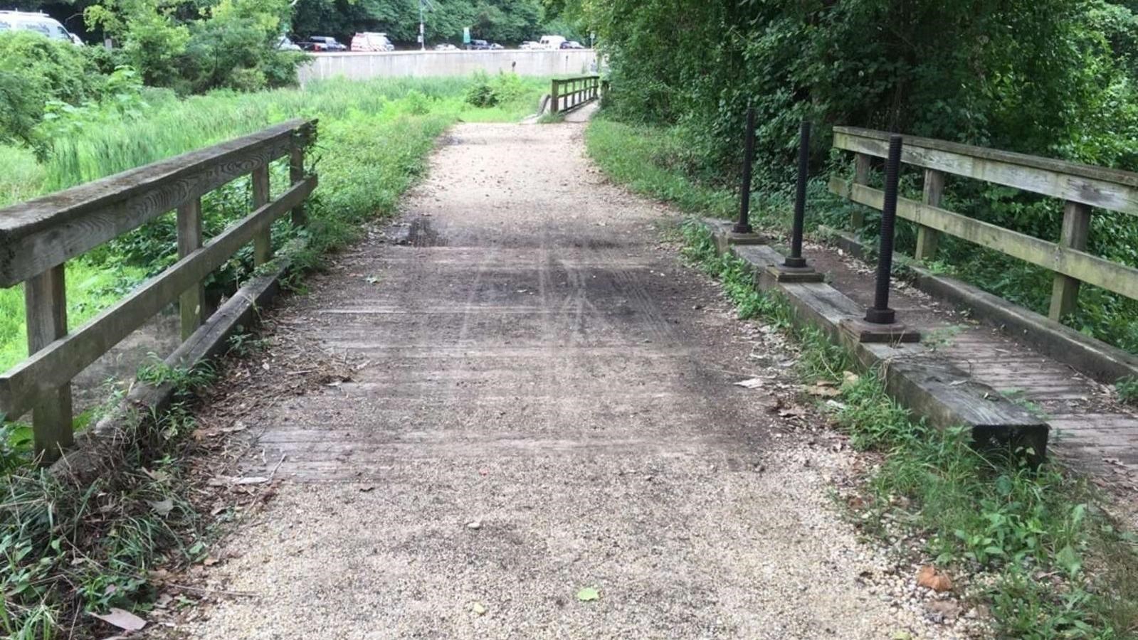 A dirt path crosses over part of the canal
