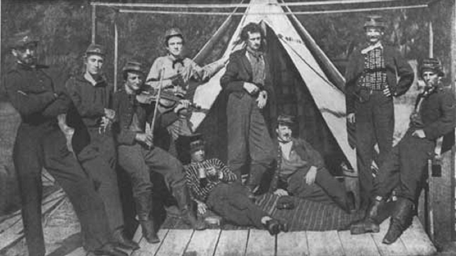 Historic image of Civil War soldiers in front of a tent