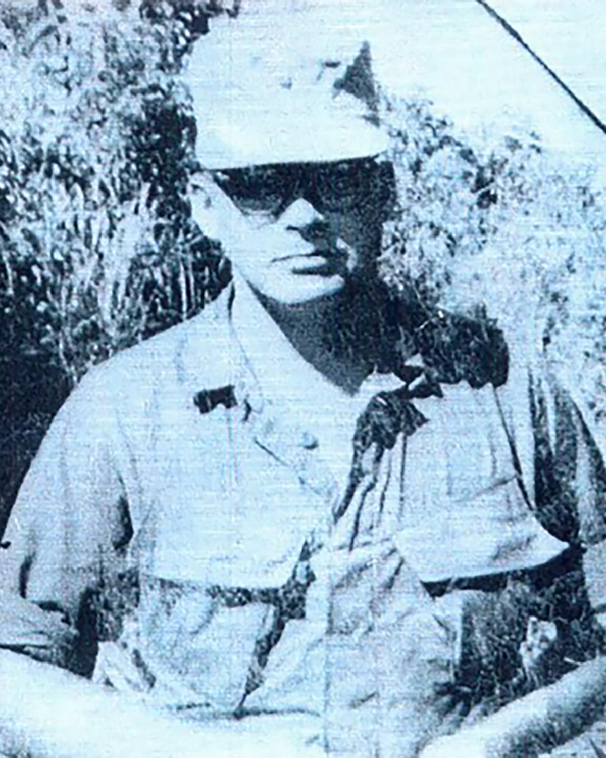 A soldier wearing glasses.
