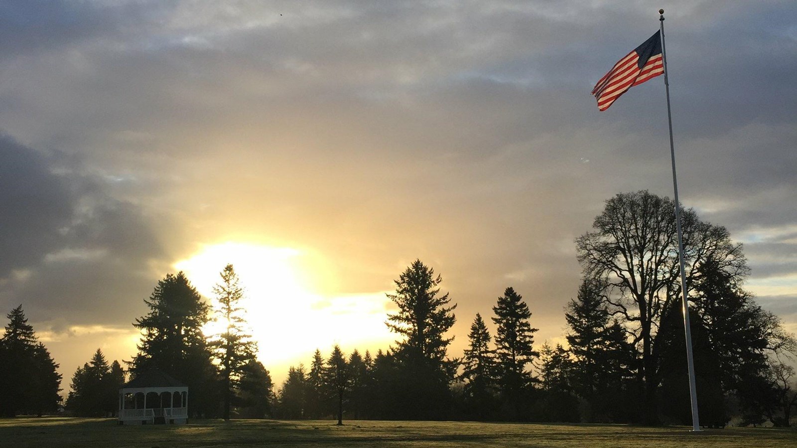 The flagstaff on the Parade Ground at sunrise.