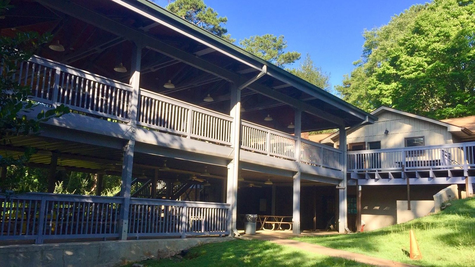 View the of the two story pavilion and adjoining house that makes up the Education Center.