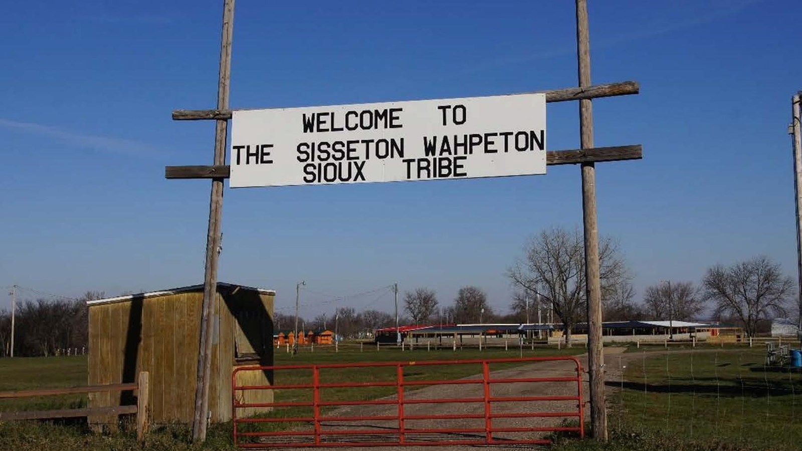 Gate with sign that says