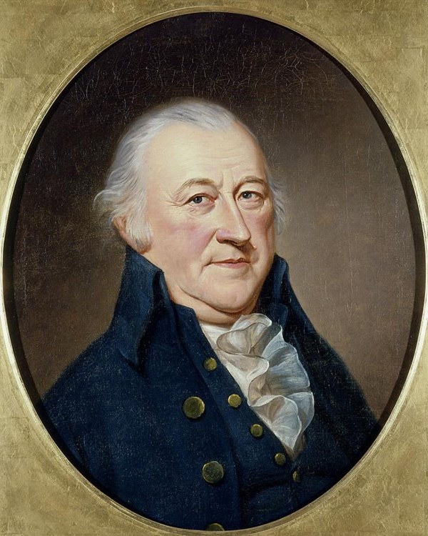 Oil painting of a man in dark blue waistcoat & high-collared coat, both with brass buttons