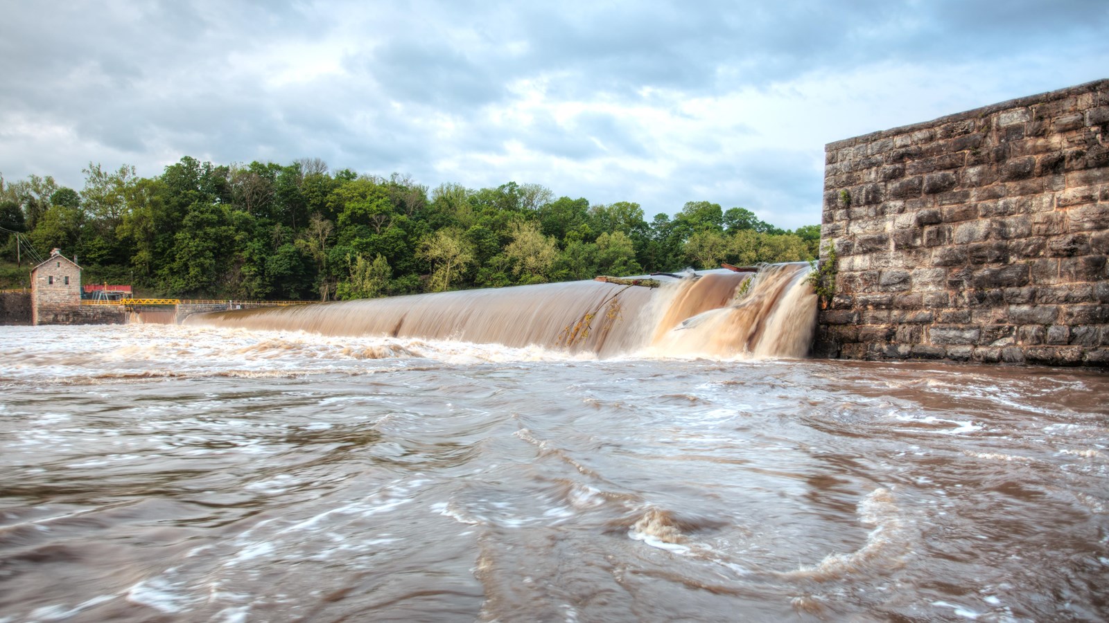 Water flows over dam 4.