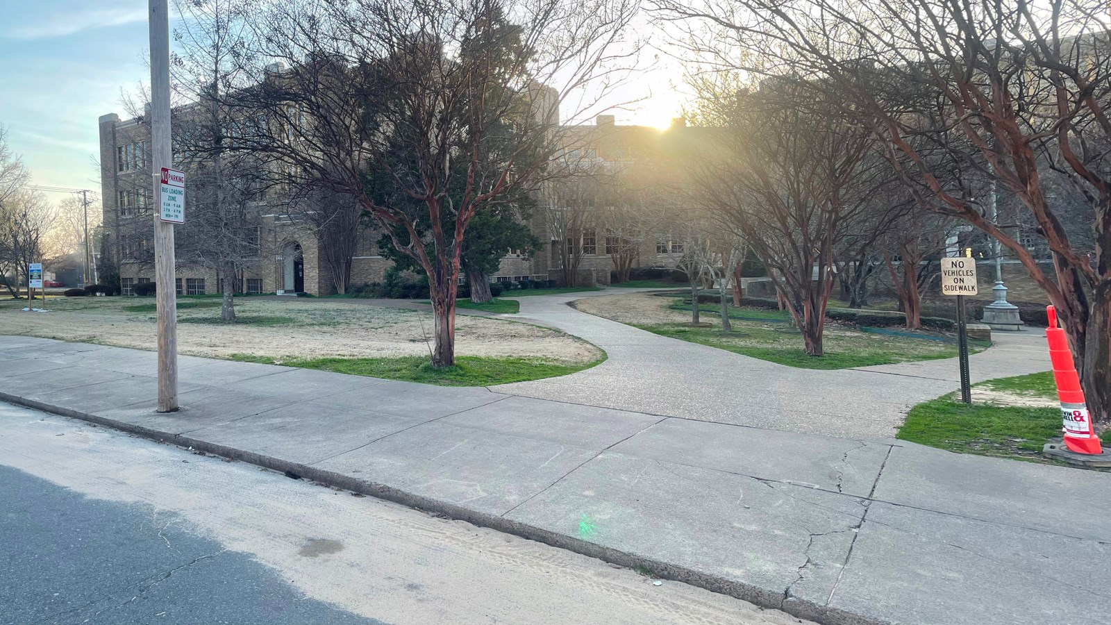 This junction of two sidewalks provides access to the sunken plaza or to the front entrance.