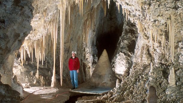 Photo of a visitor in Lower Cave.