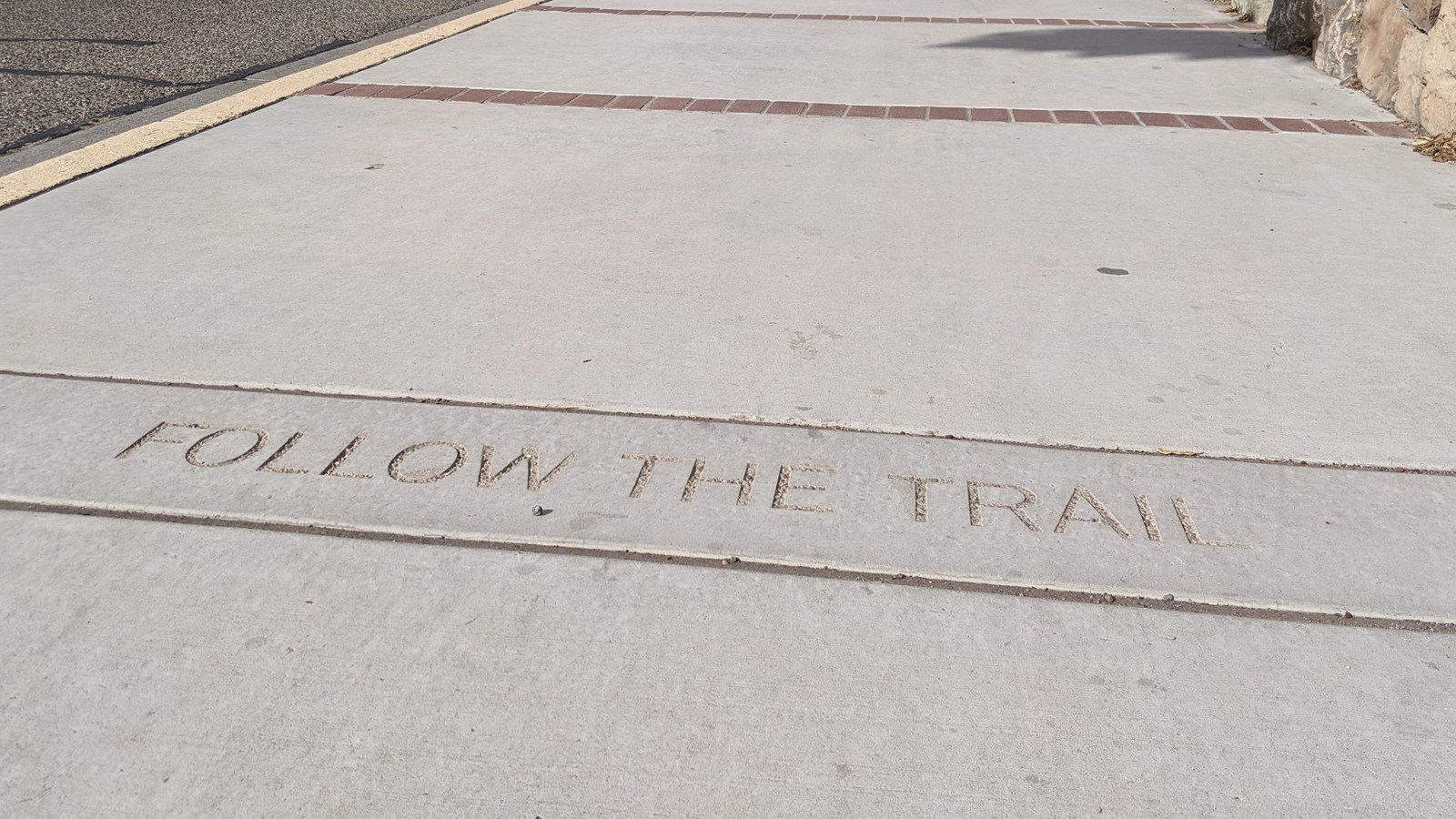 Words on the sidewalk at the start of Martineztown Walking Tour