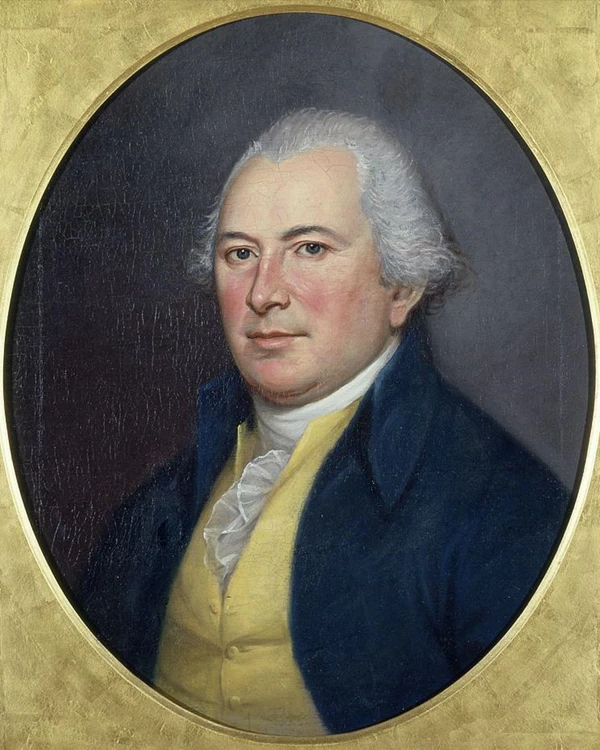 Oil painting of a man wearing a yellow waistcoat, blue coat, and powdered wig.