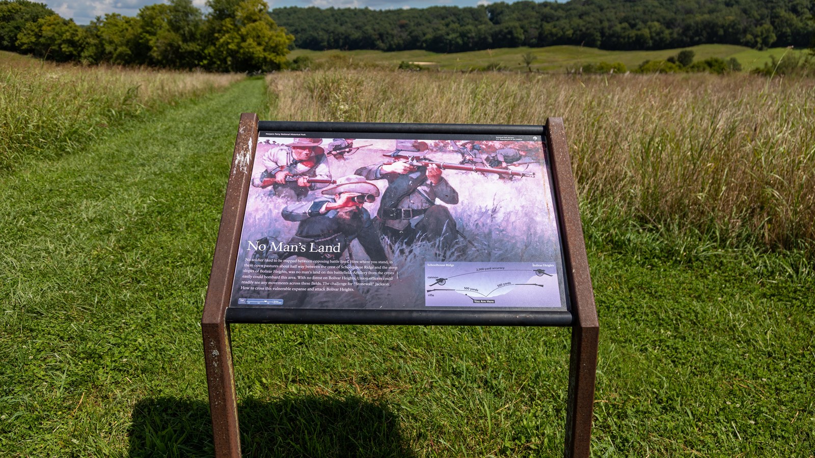A scratch image on the panel shows three men holding rifles and binoculars hiding in the grass.