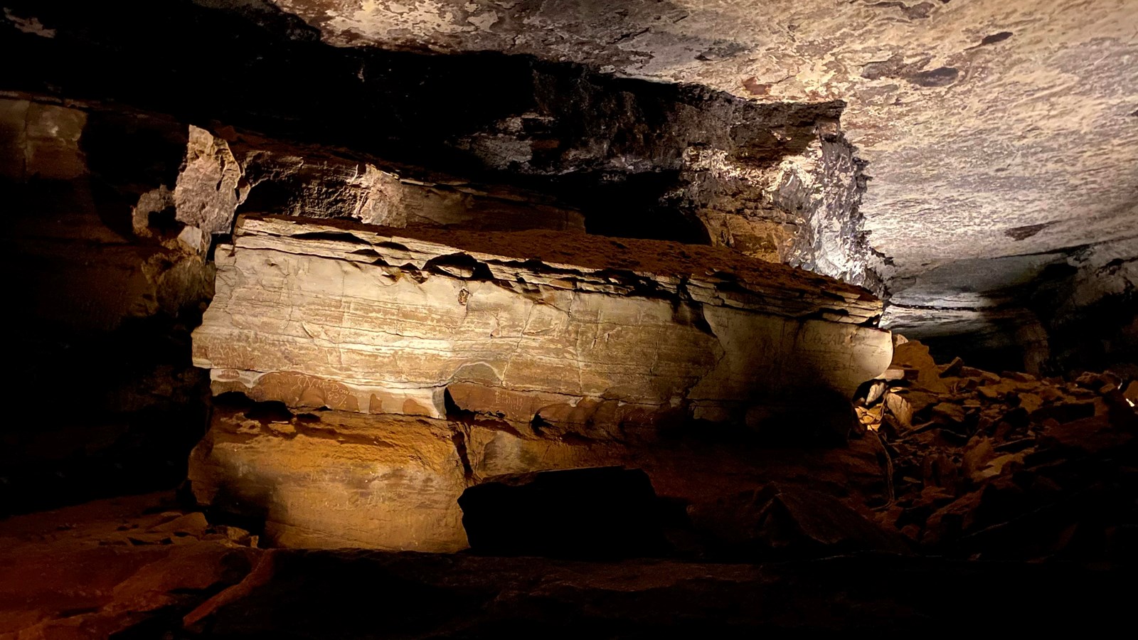 A large rock resembling the shape of the coffin.