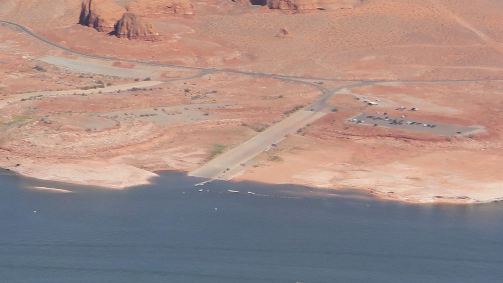 aerial view of launch ramp on desert lake