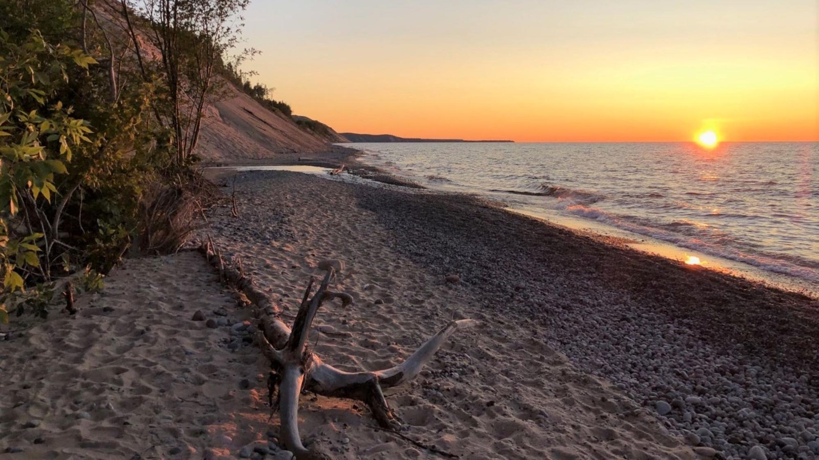 Sunset along Sable Falls Beach overlooking Lake Superior.