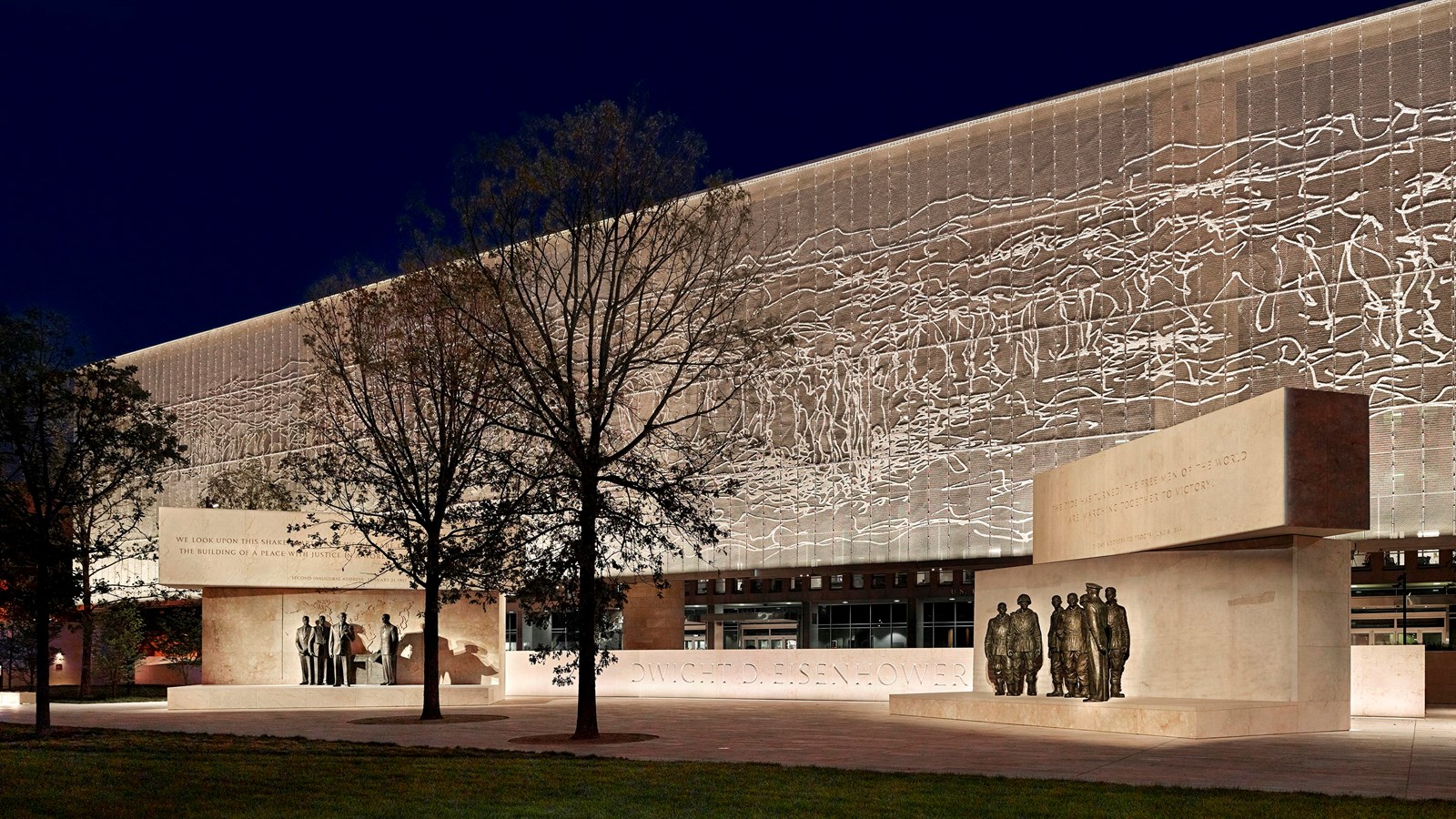 Memorial consisting of three visible statues.