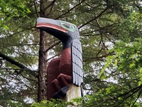 A stylized carved Cormorant